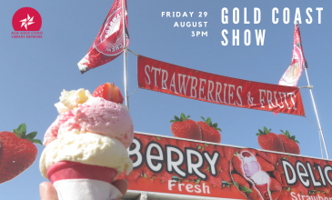 gold coast august 2025 A strawberry ice-cream with a strawberry on the top. Banners and flags advertising ice-cream.